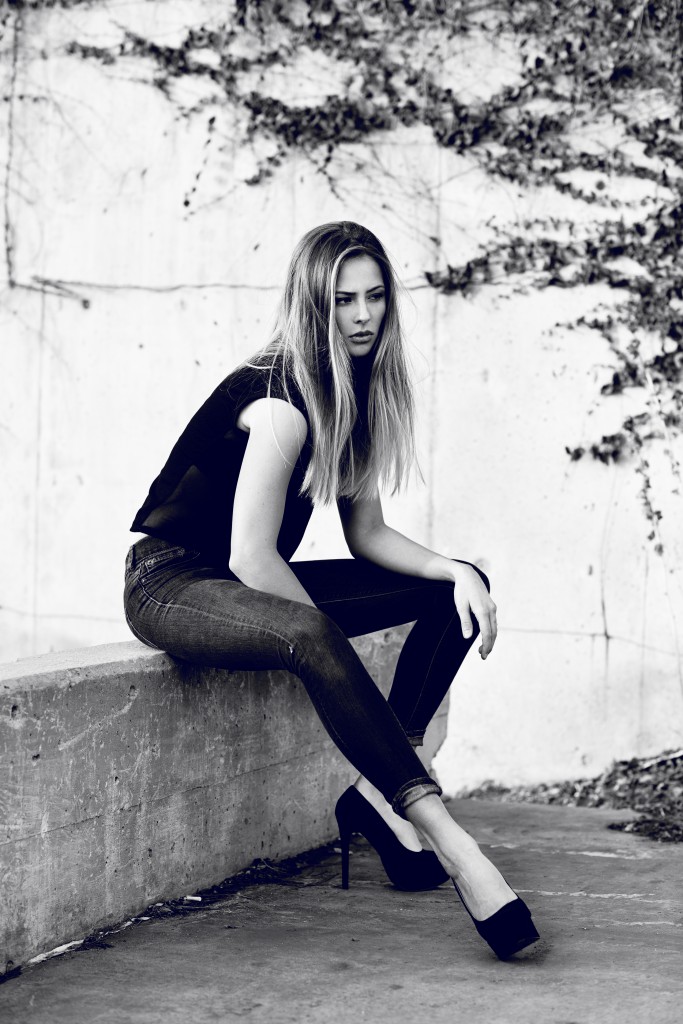 Hailey wilhelmina model in Hudson Valley on a concrete backdrop with fall colors